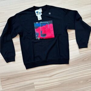 Uniqlo Black Crewneck Sweater with Pink Graphic